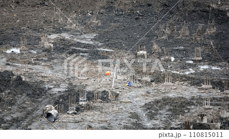 Kiev, Ukraine March 13, 2019: Workers - zero-cycle construction of the foundation of an entertainment center Kiev, Ukraine March 13, 2019: Workers - zero-cycle construction of the foundation of an entertainment center 110815011