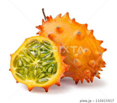 Kiwano and half close-up on a white background. Horned melon isolated Kiwano and half close-up on a white background. Horned melon isolated 110815917