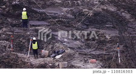 Kiev, Ukraine March 13, 2019: Workers - zero-cycle construction of the foundation of an entertainment center Kiev, Ukraine March 13, 2019: Workers - zero-cycle construction of the foundation of an entertainment center 110816303