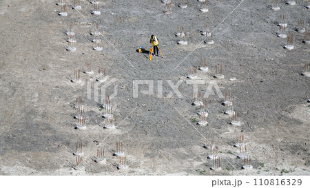 Kiev, Ukraine March 13, 2019: Workers - zero-cycle construction of the foundation of an entertainment center Kiev, Ukraine March 13, 2019: Workers - zero-cycle construction of the foundation of an entertainment center 110816329