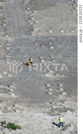 Kiev, Ukraine March 13, 2019: Workers - zero-cycle construction of the foundation of an entertainment center Kiev, Ukraine March 13, 2019: Workers - zero-cycle construction of the foundation of an entertainment center 110816333