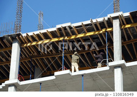 Kiev, Ukraine March 18, 2020: Workers at high altitude 110816349