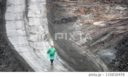 Kiev, Ukraine March 13, 2019: Workers - zero-cycle construction of the foundation of an entertainment center Kiev, Ukraine March 13, 2019: Workers - zero-cycle construction of the foundation of an entertainment center 110816456