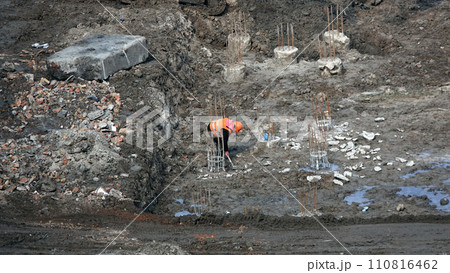 Kiev, Ukraine March 13, 2019:  Workers - zero-cycle construction of the foundation of an entertainment center 110816462