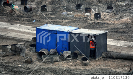 Kiev, Ukraine March 13, 2019: Workers - zero-cycle construction of the foundation of an entertainment center Kiev, Ukraine March 13, 2019: Workers - zero-cycle construction of the foundation of an entertainment center 110817136