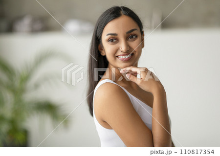 Gorgeous Young Indian Lady Touching Face Caring For Facial Skin 110817354