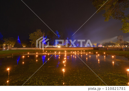 Sukhothai Historical Park festival, buddha pagoda stupa in a temple, Sukhothai, Thailand. Thai buddhist temple architecture at night. Tourist attraction. 110821781