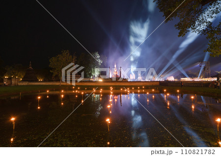 Sukhothai Historical Park festival, buddha pagoda stupa in a temple, Sukhothai, Thailand. Thai buddhist temple architecture at night. Tourist attraction. Sukhothai Historical Park festival, buddha pagoda stupa in a temple, Sukhothai, Thailand. Thai buddhist temple architecture at night. Tourist attraction. 110821782
