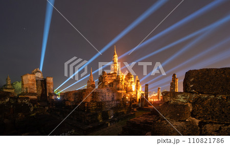 Sukhothai Historical Park festival, buddha pagoda stupa in a temple, Sukhothai, Thailand. Thai buddhist temple architecture at night. Tourist attraction. 110821786