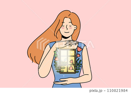 Positive woman demonstrates purity of soul and absence of sins, holding window with flowers in hands 110821984