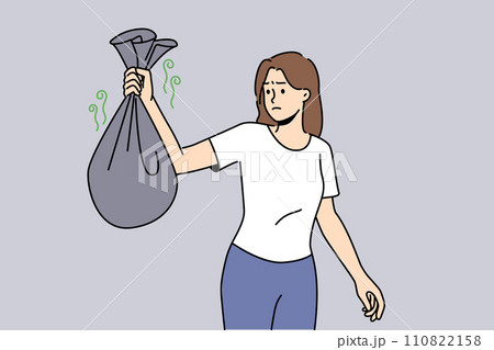 Woman with bag smelly garbage, carries waste into trash can and feels disgusted because of bad smell Woman with bag smelly garbage, carries waste into trash can and feels disgusted because of bad smell 110822158