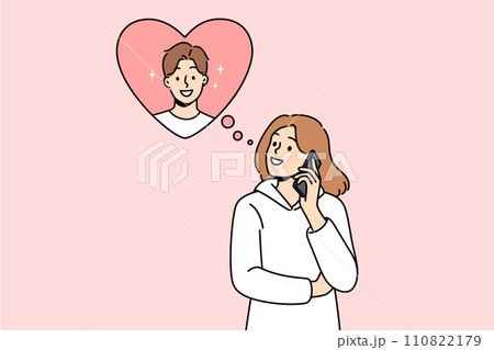 Woman makes phone call to boyfriend, wanting to flirt or invite him to romantic weekend dinner 110822179