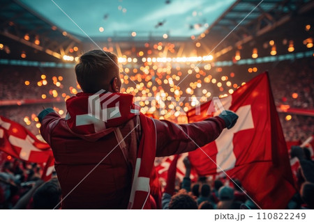 AI-generated content. Soccer fan or football fan with flag at cheering while winning match. Generative AI 110822249