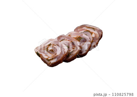Delicious meatloaf with lard, salt, spices and herbs cut into slices Delicious meatloaf with lard, salt, spices and herbs cut into slices 110825798
