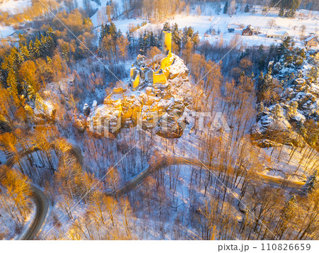 Frydstejn medieval castle ruins at cold morning sunrise time. Bohemian Paradise, Czech: Cesky raj, Czechia. Aerial view from above. Frydstejn medieval castle ruins at cold morning sunrise time. Bohemian Paradise, Czech: Cesky raj, Czechia. Aerial view from above. 110826659