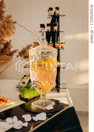Assortment of delicious snacks on the open buffet festive table in restaurant. Catering plate Assortment of delicious snacks on the open buffet festive table in restaurant. Catering plate 110826816