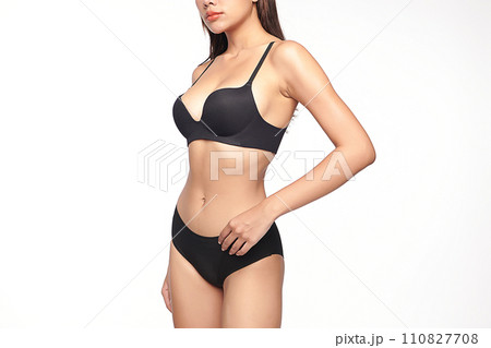 Confident beautiful young asian woman posing in black lingerie on white background, Perfect body, Confident beautiful young asian woman posing in black lingerie on white background, Perfect body, 110827708