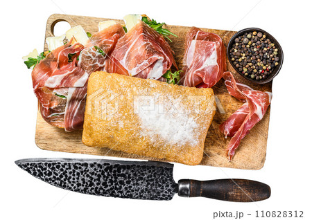 Ciabatta sandwich with prosciutto crudo ham, arugula and camembert brie cheese. Isolated on white background, Top view. 110828312