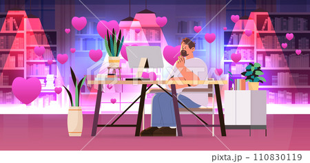 man in love using laptop social media communication happy valentines day celebration concept living room interior with pink hearts man in love using laptop social media communication happy valentines day celebration concept living room interior with pink hearts 110830119