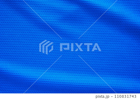 Blue football jersey clothing fabric texture sports wear background, close up top view 110831743