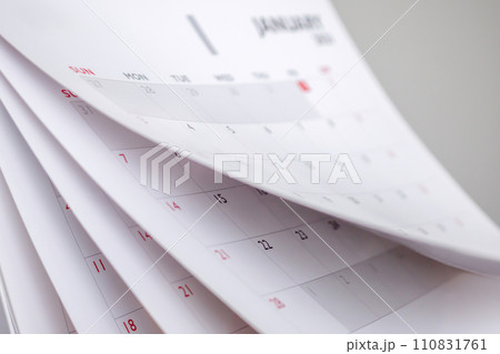 Calendar page flipping sheet close up blur background business schedule planning appointment meeting concept Calendar page flipping sheet close up blur background business schedule planning appointment meeting concept 110831761