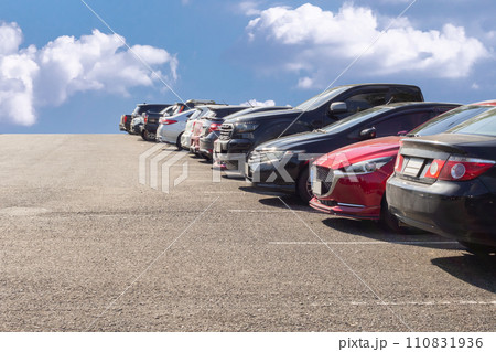 Lot of used car for sales in stock with sky and clouds 110831936
