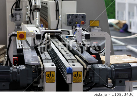 industrial automated machine at furniture factory industrial automated machine at furniture factory 110833436
