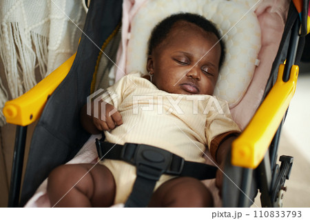 Little Black baby girl sleeping in stroller Little Black baby girl sleeping in stroller 110833793