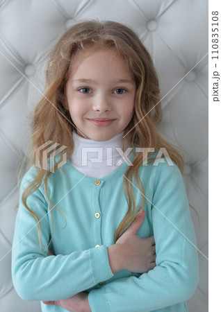 Close up portrait of cute girl smiling  110835108