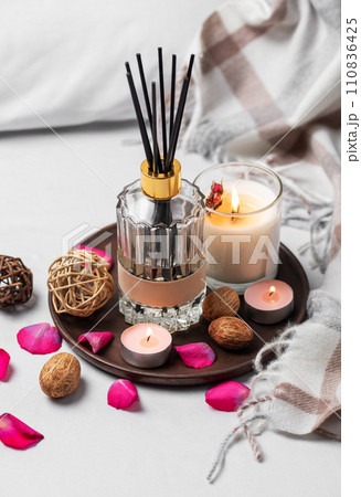 Cozy home atmosphere. Home liquid fragrance in glass bottle 110836425
