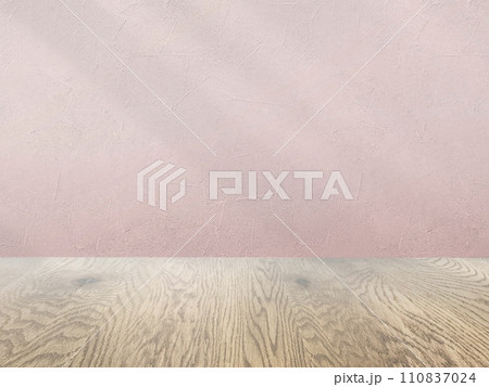 ピンクの壁とナチュラルで木目の床の背景画像素材、淡い影が入った壁とフローリングのバックグラウンド 110837024