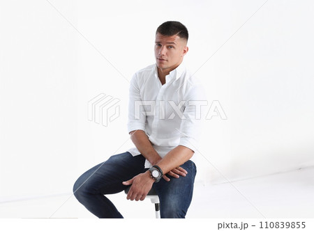 Young successful businessman on a white 110839855