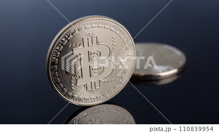 Coin of crypto currency bitcoin on a gray-blue 110839954