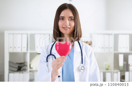Female medicine doctor hands holding and covering Female medicine doctor hands holding and covering 110840013
