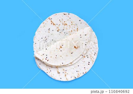 Quinoa tortilla wraps on blue background 110840692