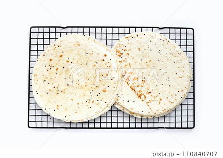 Quinoa tortilla wraps on white background Quinoa tortilla wraps on white background 110840707