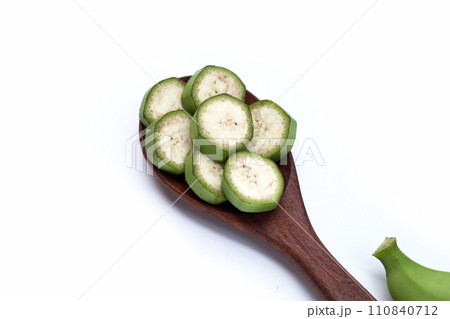 Raw banana slices on white background. 110840712