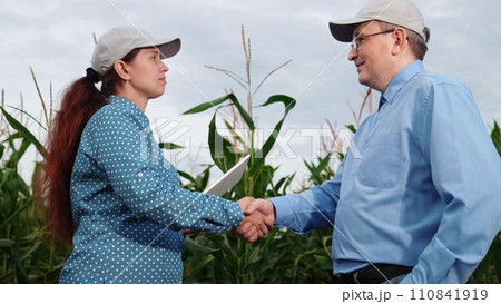agriculture, farmers handshake field, business corn farm, farmer working tablet with partner, business handshake, soil, working, grow, laughing, information, farmer, sweet corn, countryside, raw, male agriculture, farmers handshake field, business corn farm, farmer working tablet with partner, business handshake, soil, working, grow, laughing, information, farmer, sweet corn, countryside, raw, male 110841919