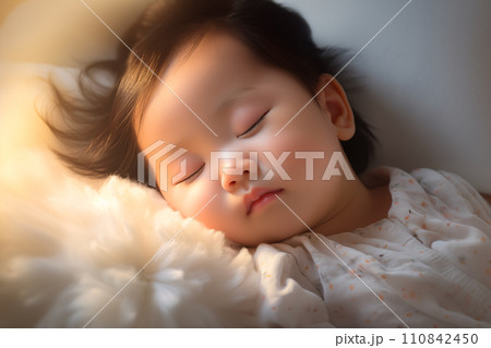 すやすやと眠る赤ちゃん 110842450