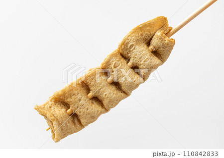 Skewered fish cake on white background 110842833