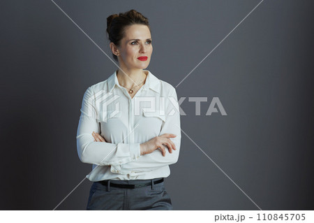 business owner woman looking at copy space isolated on grey 110845705