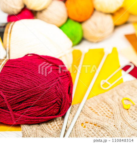 Threads in reels. Colored bobbins for embroidery knitting hobby accessories creativity. Threads in reels. Colored bobbins for embroidery knitting hobby accessories creativity. 110848314