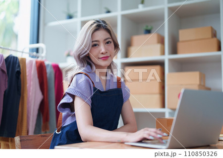 Portrait Of Asian Female Owner Of Fashion Store Clothing Store successful happy smile at small business, sme or ecommerce concepts. 110850326