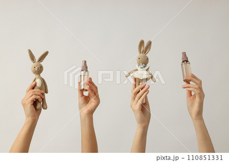 Things for children, in the hands of many women. 110851331