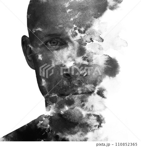 A black and white double exposure male portrait in an artistic manner 110852365
