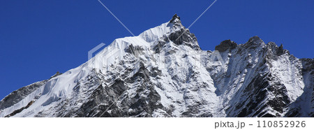 Snow covered peak near Gorak Shep, Sagarmatha National Park, Nepal. Snow covered peak near Gorak Shep, Sagarmatha National Park, Nepal. 110852926