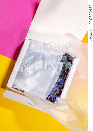 Simple white cardboard box on color background, top view 110853480