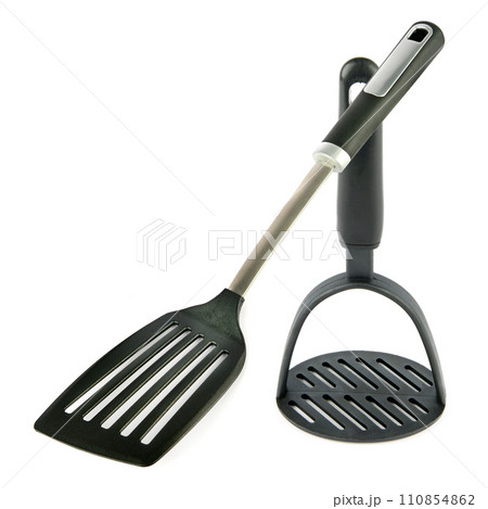 Puree masher and a kitchen spatula isolated on white. Free space for text. Collage. 110854862