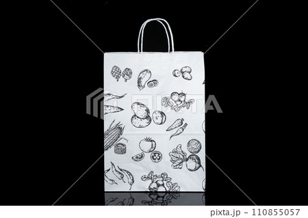 Recyclable craft paper bag for purchases, gifts and takeaway food mock up on black background. Environmentally friendly than single-use plastic bags Recyclable craft paper bag for purchases, gifts and takeaway food mock up on black background. Environmentally friendly than single-use plastic bags 110855057