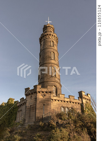 Nelson's Monument with a bright blue sky in the background. 110855124